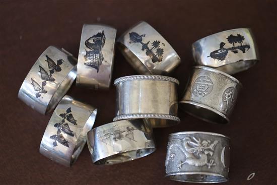 Assorted continental white metal and niello items including napkin rings, compact, dish etc.